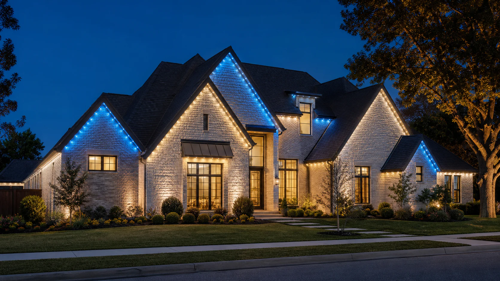Integrated permanent LED lights tracing the peaks and eaves of a Dallas-area home